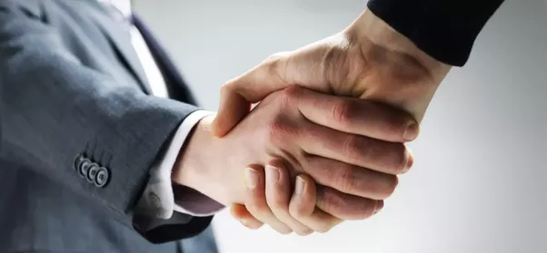 Business leaders shaking hands